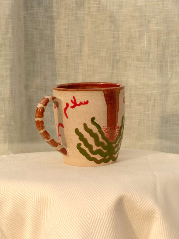 Wheel-thrown Nakhla ceramic mug with khaleeji design