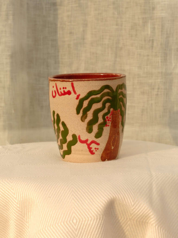 Wheel-thrown Nakhla ceramic mug with khaleeji design