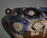 Tall coil-built stoneware vase decorated with sketches and Icelandic black sand