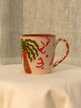 Wheel-thrown Nakhla ceramic mug with khaleeji design