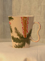 Wheel-thrown ceramic mug with wavy handle and Arabic calligraphy