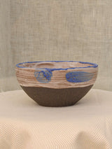 Set of two black clay bowls with textured crawling glaze