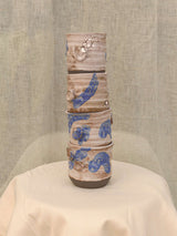 Set of two black clay cups with crawling glaze and seashell imprint