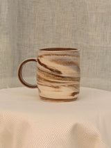 Wheel-thrown cream and brown swirl ceramic mug