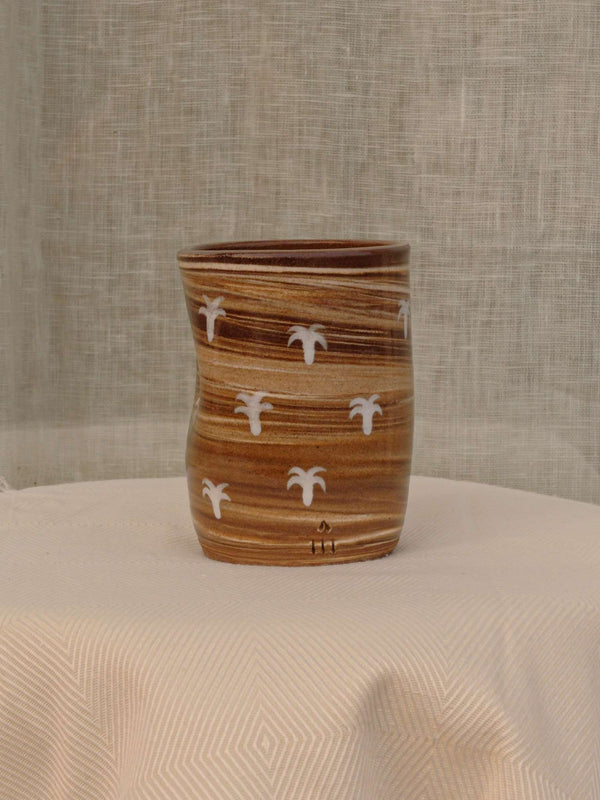 Wheel-thrown two-tone swirl ceramic tumbler with thumb rest
