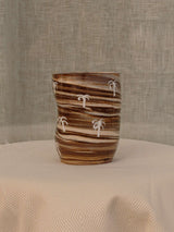 Wheel-thrown two-tone swirl ceramic tumbler with thumb rest