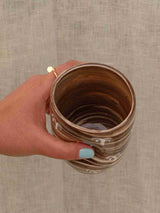 Wheel-thrown two-tone swirl ceramic tumbler with thumb rest