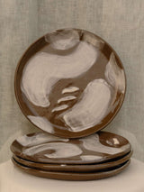 Set of two black clay plates with white slip brush strokes