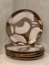 Set of two black clay plates with white slip brush strokes
