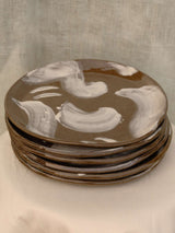 Set of two black clay plates with white slip brush strokes